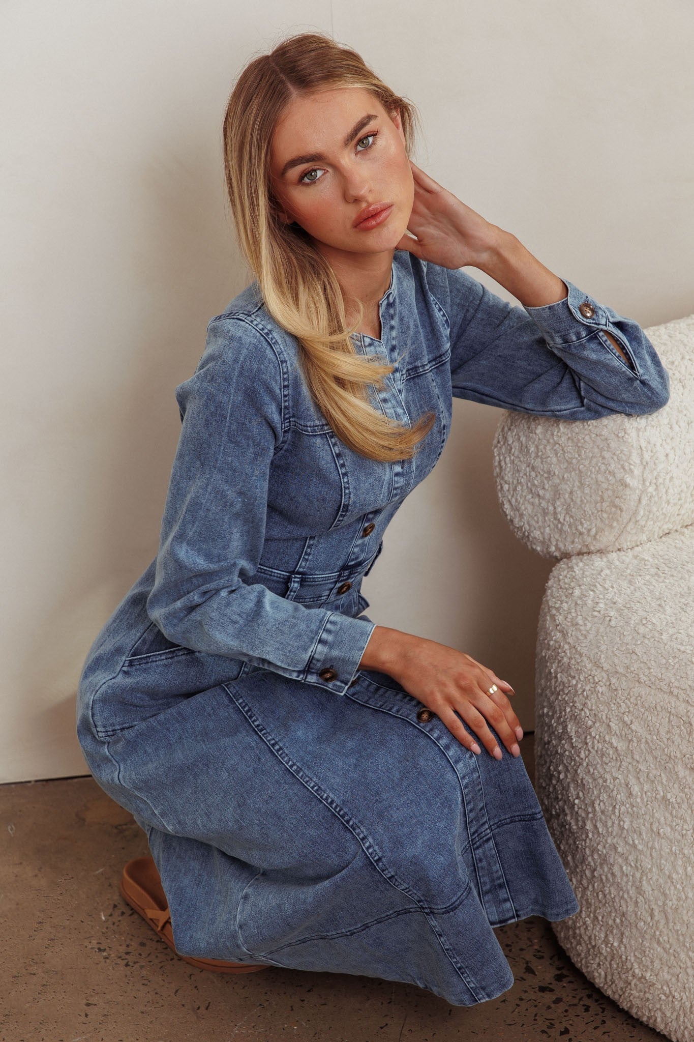 Indigo Empress Long Sleeve Denim Midi Dress with front buttons, embellished stitching, and ruched back detail, perfect for fall in denim blue.